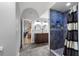 Spacious bathroom with double vanity, walk-in shower, and stylish fixtures at 222 Via Mariel E Dr, Davenport, FL 33896