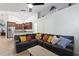 Bright living area with vaulted ceilings and an open concept to the kitchen at 222 Via Mariel E Dr, Davenport, FL 33896