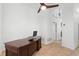 Bright office features a modern desk, ceiling fan and light tile floors at 222 Via Mariel E Dr, Davenport, FL 33896