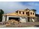 Exterior view of a home under construction with visible wood framing and cinder block base at 2430 Francisco Art Ct, Oviedo, FL 32765