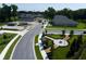 Community street view displaying new construction, landscaping, and sidewalks at 2430 Francisco Art Ct, Oviedo, FL 32765