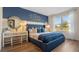 Stylish main bedroom showcases contemporary decor and a serene, comfortable space at 2911 Moulin Rd, Davenport, FL 33837