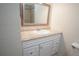 Bathroom features a vanity with countertop, mirror, and tiled shower at 2936 Antique Oaks Cir # 71, Winter Park, FL 32792