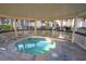 The property includes a private outdoor jacuzzi set in a gazebo with views of the surrounding community at 2936 Antique Oaks Cir # 71, Winter Park, FL 32792