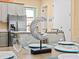 Nicely decorated dining table for six guests, features stylish center piece and modern dinnerware at 3095 Key Lime Loop, Kissimmee, FL 34747