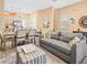Cozy living room featuring stylish furniture, open layout, and inviting decor at 3095 Key Lime Loop, Kissimmee, FL 34747