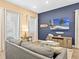 Cozy living room with contemporary decor and an open layout at 3095 Key Lime Loop, Kissimmee, FL 34747