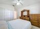 Bright bedroom featuring a ceiling fan and carpet at 3635 Kingswood Ct, Clermont, FL 34711