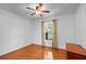 Cozy bedroom with hardwood floors and natural light offers a peaceful retreat at 40610 Babb Rd, Umatilla, FL 32784