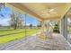 Screened in porch with views of the lake is perfect for enjoying the outdoors at 40610 Babb Rd, Umatilla, FL 32784