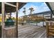 Deck featuring built-in grilling area and views of the pool at 425 N Pine Meadow Dr, Debary, FL 32713