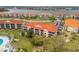 Beautiful aerial view of condo community with multiple buildings and waterfront access at 445 Bouchelle Dr # 104, New Smyrna Beach, FL 32169