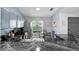 Granite countertops accent this kitchen with stainless appliances and blue cabinets at 4618 Prairie Point, Kissimmee, FL 34746