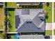 Overhead aerial view showing solar panels and landscaped yards in a residential neighborhood at 4862 Grand Vista Ln, St Cloud, FL 34771
