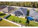 Birds eye view showcasing solar panels atop the roof of this meticulously maintained home at 4862 Grand Vista Ln, St Cloud, FL 34771