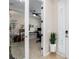 View of an open doorway leading to an office space with a modern ceiling fan at 4862 Grand Vista Ln, St Cloud, FL 34771