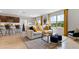 Open-concept living room features stylish furniture, plenty of light, and decor accents at 5215 Ligonberry St, Lakeland, FL 33811