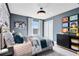 Stylish bedroom with gaming-themed decor, a large window, and a closet at 6006 Forest Perch Dr, St Cloud, FL 34771