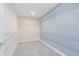 Walk-in closet with shelving for organized storage at 6006 Forest Perch Dr, St Cloud, FL 34771