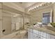 Bright bathroom featuring granite countertop, a glass shower, and updated fixtures at 638 Maple Oak Cir # 112, Altamonte Springs, FL 32701