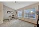 Bright room features large windows, carpet flooring, and a modern desk setup at 638 Maple Oak Cir # 112, Altamonte Springs, FL 32701