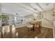 Open layout dining room with access to living spaces and a sliding door to the screened lanai at 638 Maple Oak Cir # 112, Altamonte Springs, FL 32701