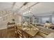 Charming dining room features a stylish light fixture and a view to the outdoor space at 638 Maple Oak Cir # 112, Altamonte Springs, FL 32701