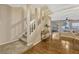 Bright entryway with wood floors, stairway, and view to the outdoor living space at 638 Maple Oak Cir # 112, Altamonte Springs, FL 32701