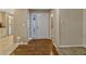 Bright foyer with tile flooring and a white entry door to the home at 638 Maple Oak Cir # 112, Altamonte Springs, FL 32701