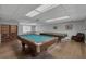 Spacious game room featuring a pool table, ping pong table, and seating area for entertainment at 638 Maple Oak Cir # 112, Altamonte Springs, FL 32701