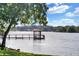 Community lake with pier and gazebo along the waterfront at 638 Maple Oak Cir # 112, Altamonte Springs, FL 32701