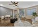 Spacious living room with sliding doors to the patio and large windows for natural light at 638 Maple Oak Cir # 112, Altamonte Springs, FL 32701