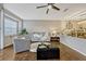 Comfortable living room with a ceiling fan, plush seating, and a decorative area rug at 638 Maple Oak Cir # 112, Altamonte Springs, FL 32701