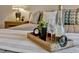 Close up of a beautifully decorated tray on the bed in the main bedroom at 638 Maple Oak Cir # 112, Altamonte Springs, FL 32701