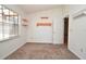 Bedroom featuring neutral carpet, white walls, a window view, and bright orange shelves at 691 Monroe Harbor Pl, Sanford, FL 32773