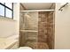 A bathroom shower enclosed with decorative stone wall at 691 Monroe Harbor Pl, Sanford, FL 32773