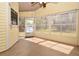 Bright sunroom with large windows offering plenty of natural light at 691 Monroe Harbor Pl, Sanford, FL 32773