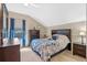 Bedroom featuring carpeted floors, neutral walls and vaulted ceiling at 8706 Irmastone Way, Orlando, FL 32817