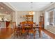 Dining room featuring hardwood floors and plenty of natural light at 8706 Irmastone Way, Orlando, FL 32817