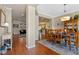 Elegant dining room with hardwood floors and stylish lighting at 8706 Irmastone Way, Orlando, FL 32817