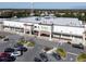 An aerial view of a nearby Publix grocery store, offering convenience to your new neighborhood at 9560 Starling Loop, Leesburg, FL 34788
