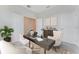 Functional home office featuring a desk, chair, and natural light at 9560 Starling Loop, Leesburg, FL 34788