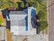 Aerial view of the house showing the roofline and surrounding landscaping at 100 N Main St, Winter Garden, FL 34787