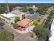 Aerial view of Winter Garden with brick roads and varied architecture on a clear, sunny day at 100 N Main St, Winter Garden, FL 34787