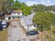 Aerial view of the home with spacious backyard and detached garage at 100 N Main St, Winter Garden, FL 34787