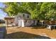 Backyard with a patio, green trees, and outdoor seating at 100 N Main St, Winter Garden, FL 34787