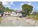 A view showcasing the exterior of the home and detached garage at 100 N Main St, Winter Garden, FL 34787