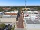 Overhead view of a quaint shopping district with brick roads, charming architecture, and ample parking at 100 N Main St, Winter Garden, FL 34787