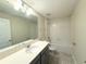 Bathroom with white countertops, single sink, and tiled floors at 10079 Memoir Ave, Winter Garden, FL 34787