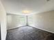 Bedroom featuring neutral walls, carpet flooring, and windows with sunlight at 10079 Memoir Ave, Winter Garden, FL 34787